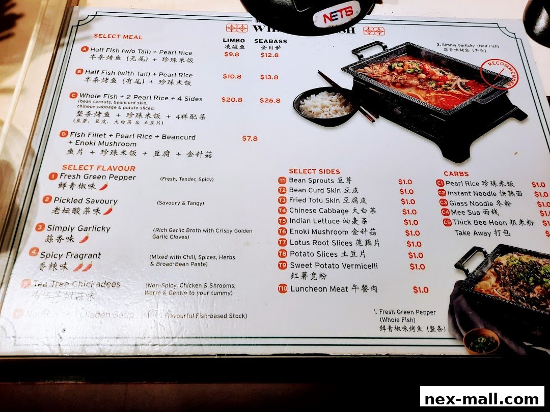 A menu for Food Junction, showcasing various fish dishes, flavors, sides, and carbs with prices.