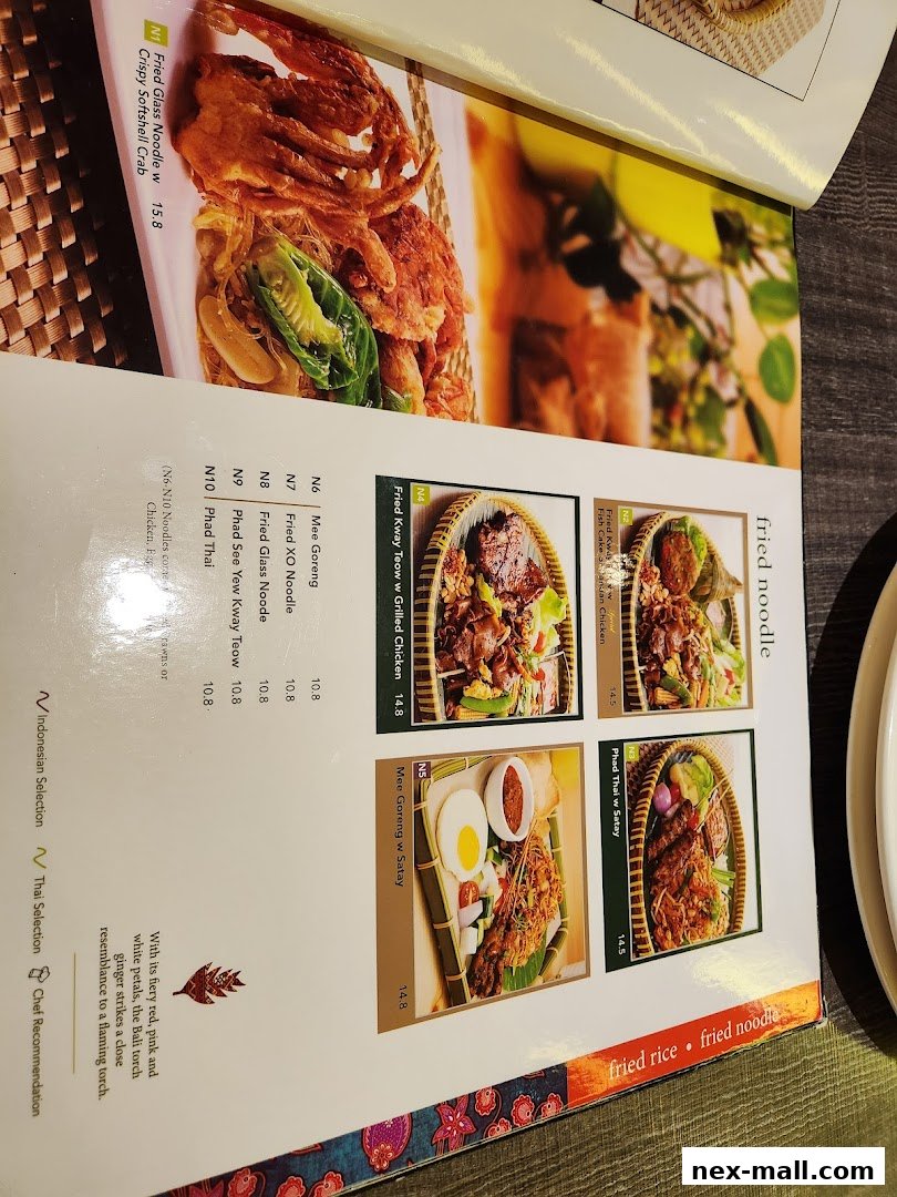 A menu page from Bali Thai NEX featuring various noodle and rice dishes with prices.