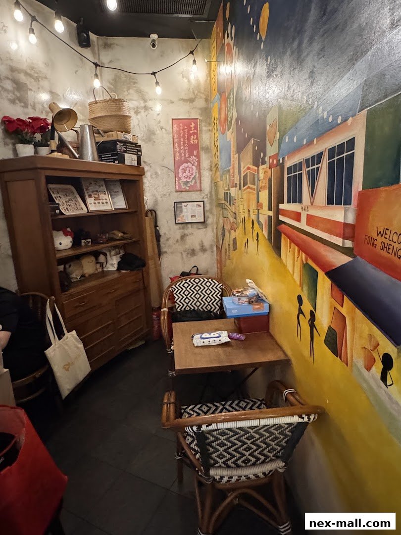 Interior shot of Fong Sheng Hao 豐盛號 Nex with a mural, wooden furniture, and decorative lights.