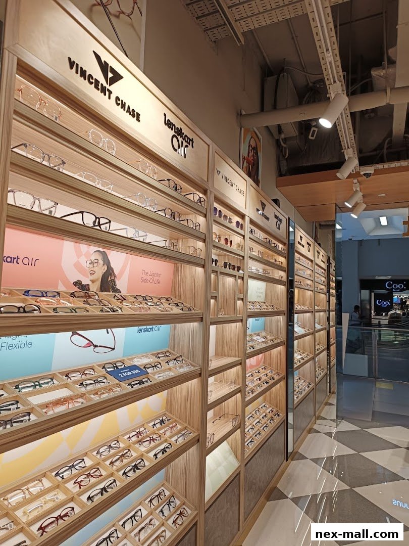 Interior view of a Lenskart store showcasing a wide selection of eyeglasses on display shelves.