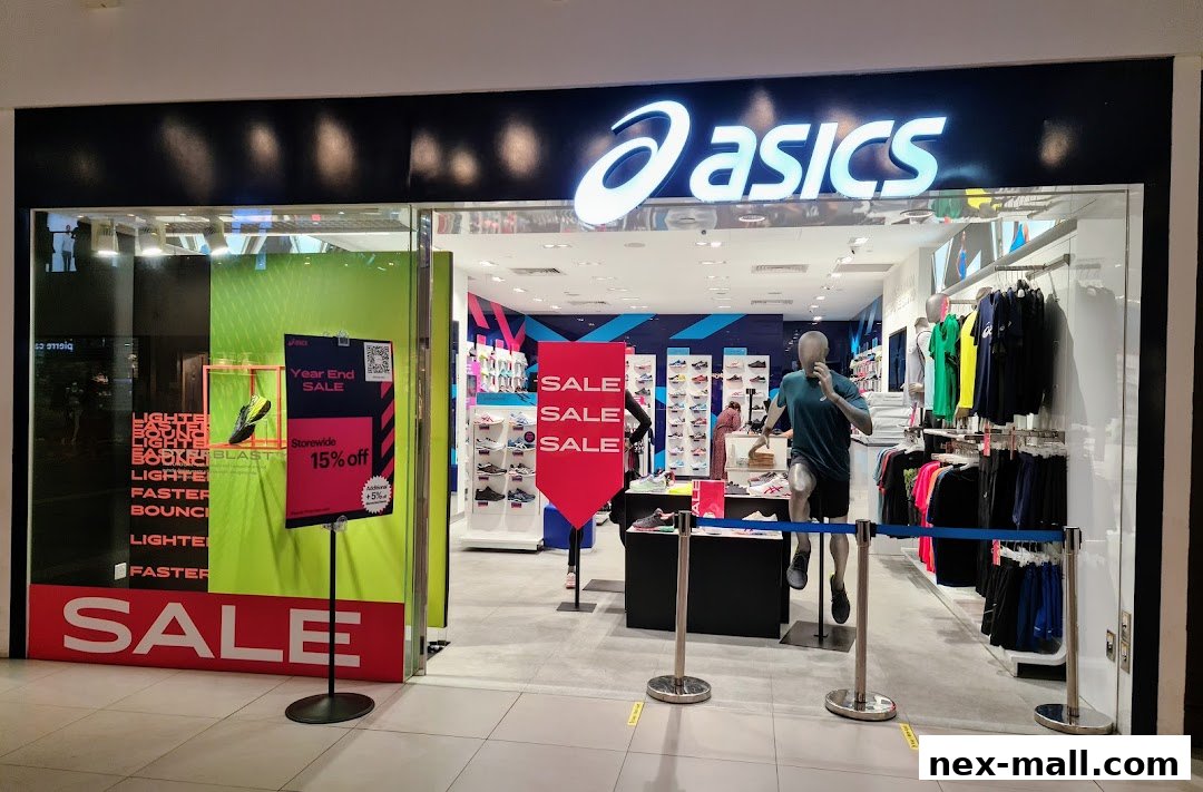 The ASICS store front features a large 'SALE' banner and displays of athletic shoes and apparel.