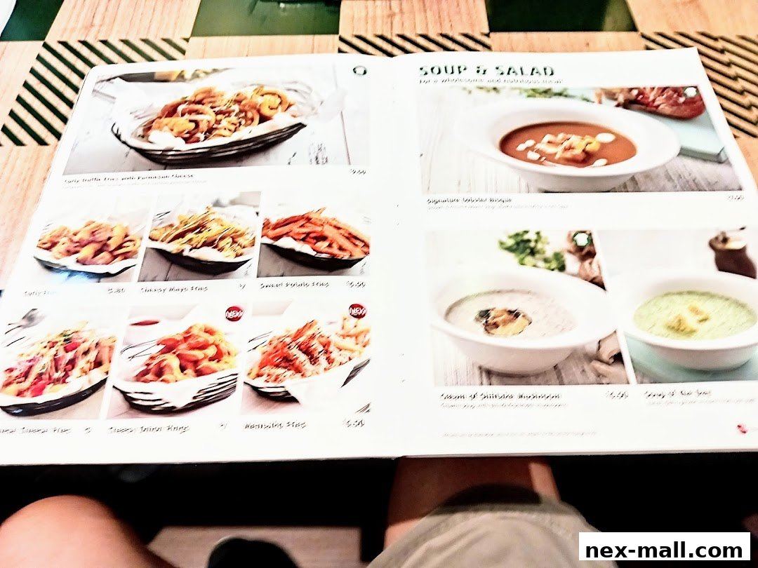 A menu featuring various fries and soups with appetizing images and prices.
