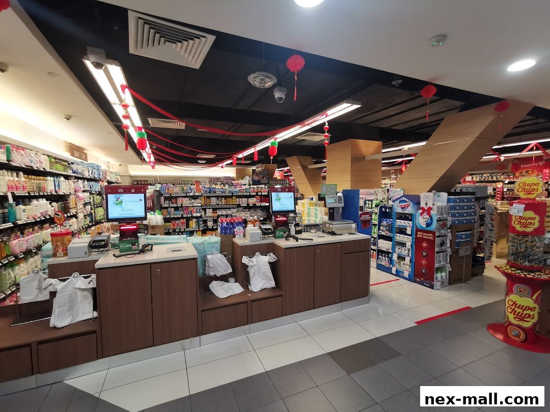 Interior view of a Cold Storage supermarket with checkout counters and shelves stocked with products.