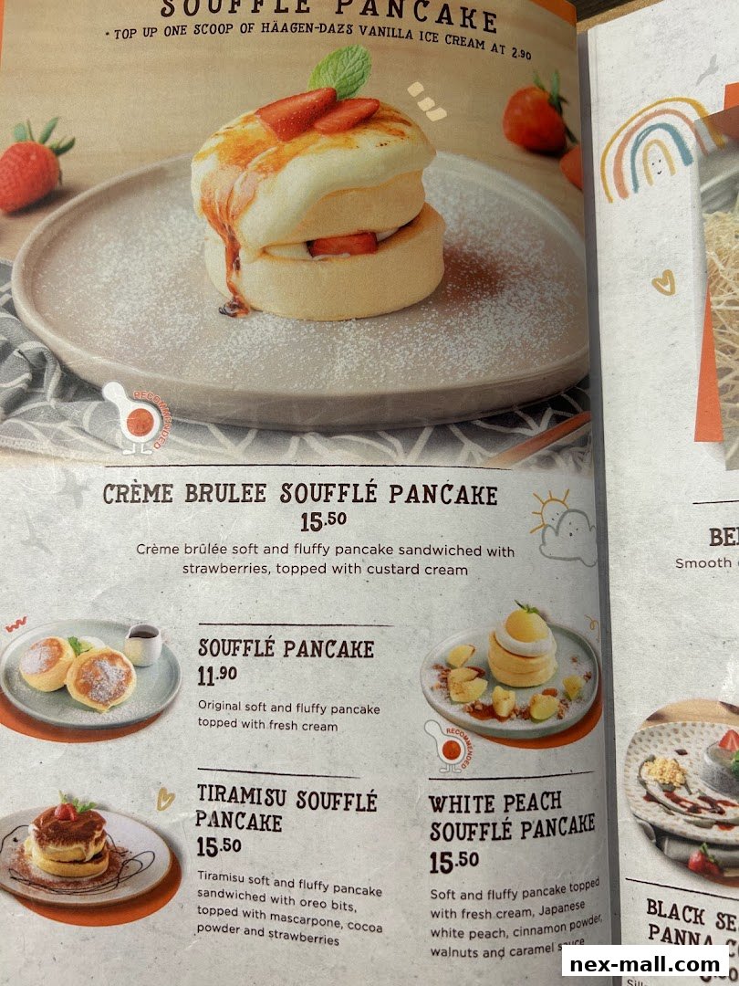 A menu featuring various soufflé pancakes with descriptions and prices.