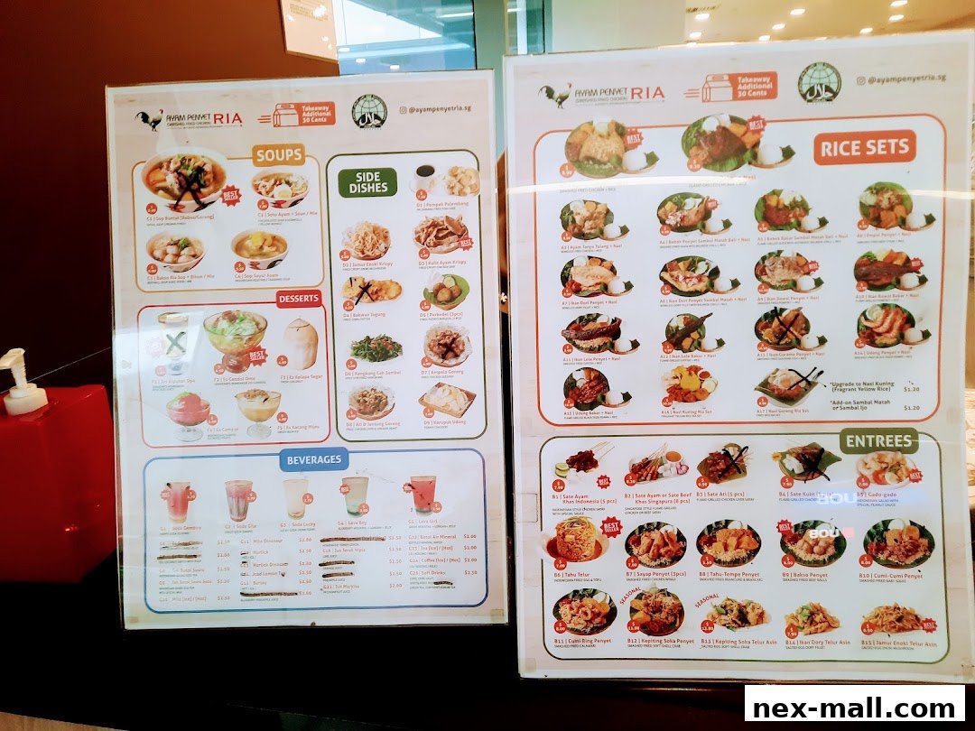 A menu from Ayam Penyet Ria showcasing various Indonesian dishes, soups, desserts, and beverages.