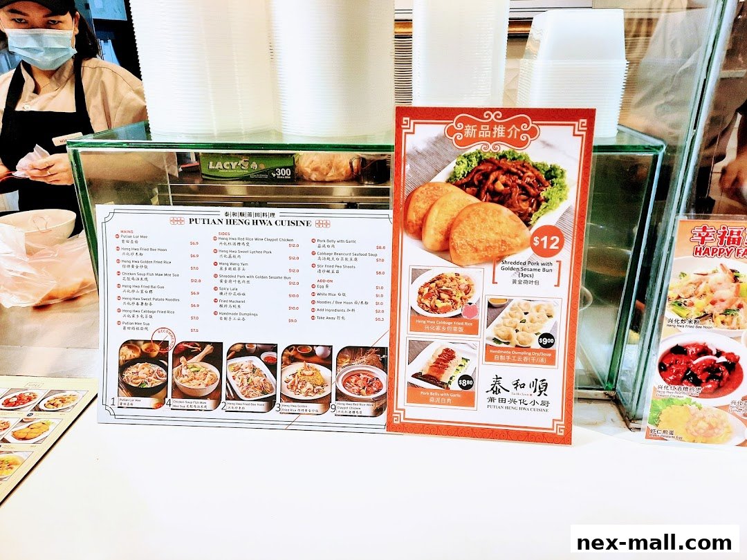 A menu board for Putian Heng Hwa Cuisine with various dishes and prices.