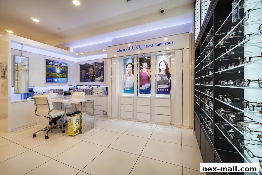 Interior of a modern optical shop with displays of contact lenses and eyeglasses.