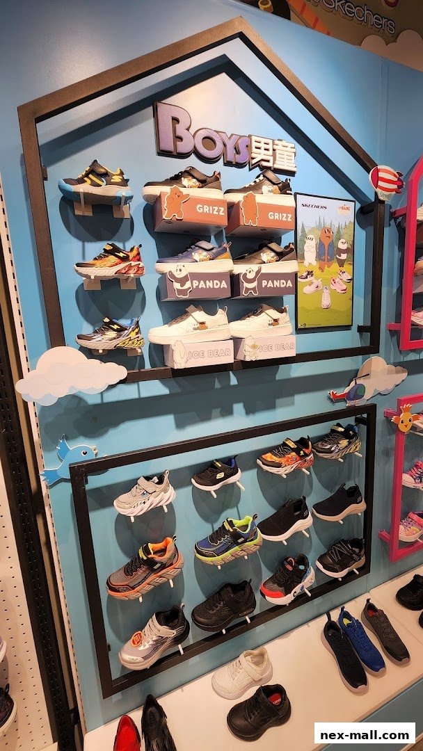 A display of Skechers boys' shoes featuring cartoon characters and various styles.