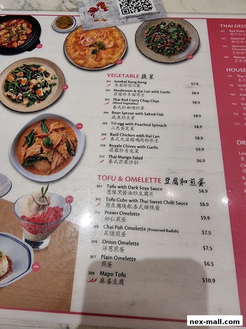 A menu from Go-Ang Pratunam Chicken Rice featuring Thai dishes, tofu, and omelettes.