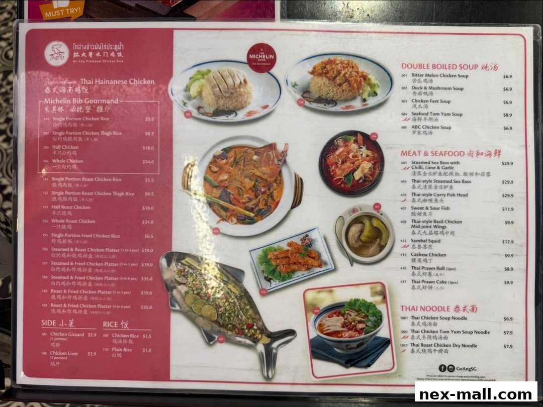 A menu for Go-Ang Pratunam Chicken Rice featuring various chicken dishes, soups, seafood, and noodles.