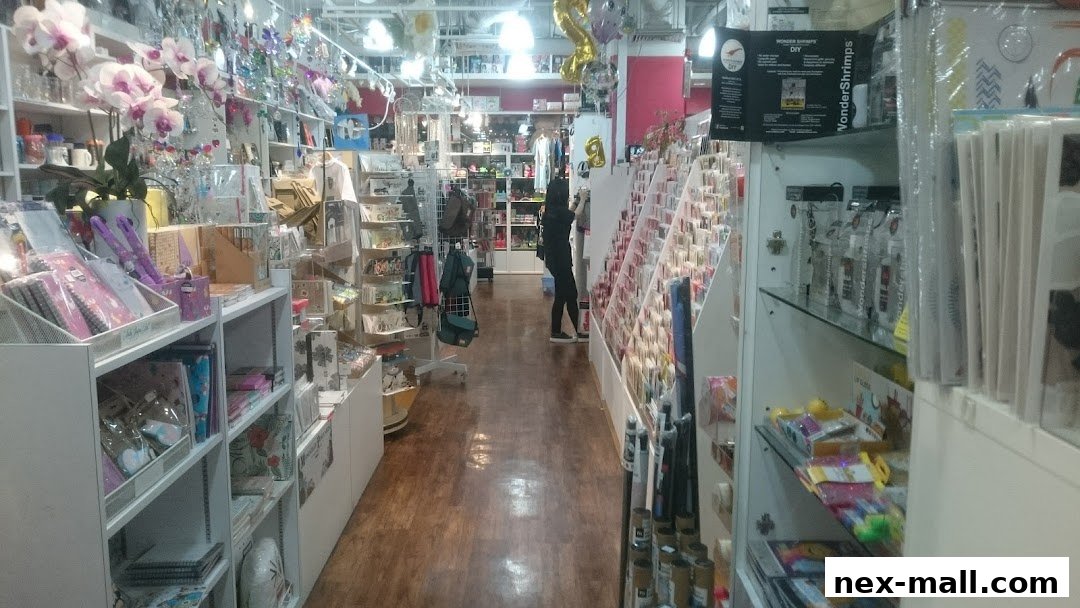Interior view of a gift and stationery shop with shelves stocked with various items.