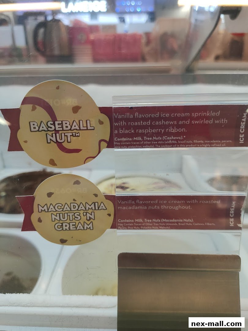 Close-up of Baskin-Robbins ice cream flavors with descriptive labels.