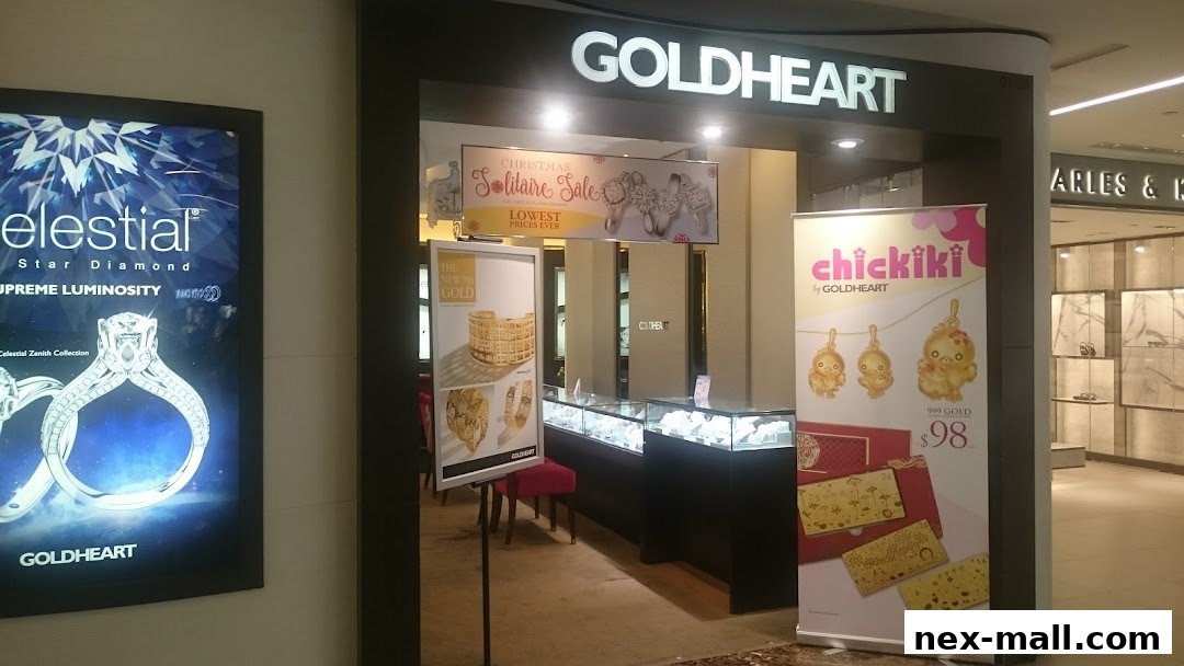 The entrance of Goldheart Jewelry store, featuring diamond rings and gold jewelry displays.
