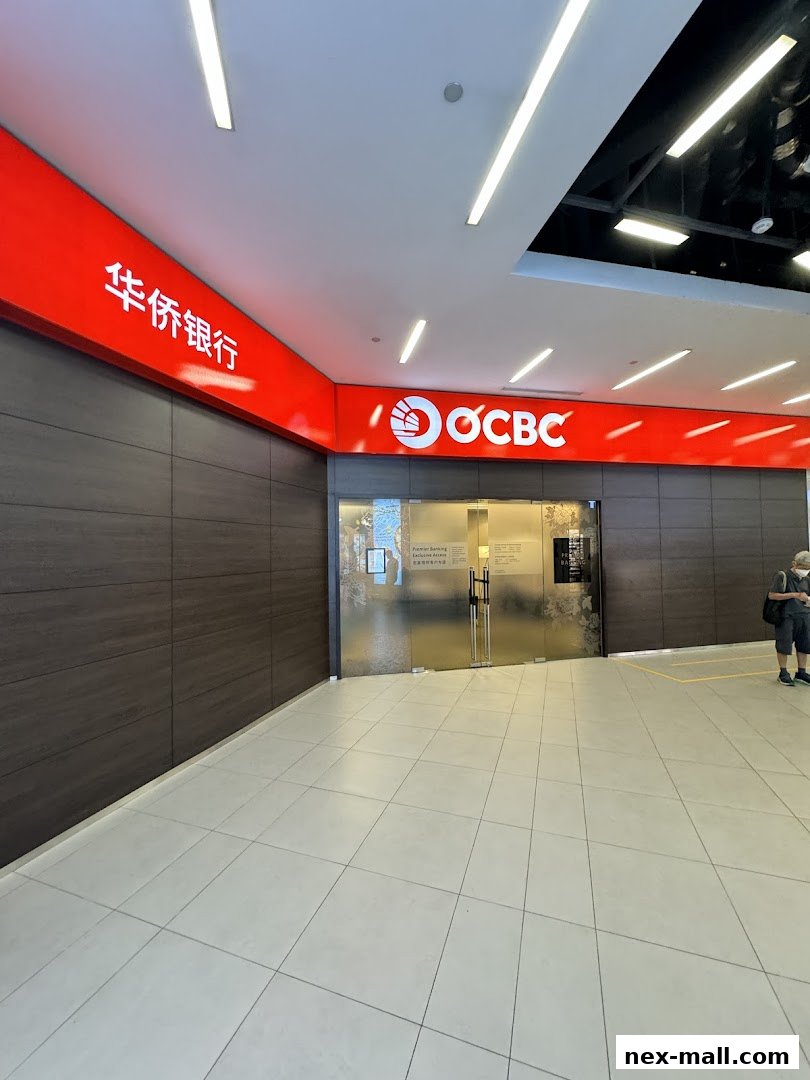 The entrance to OCBC Bank NEX, featuring prominent signage and glass doors.
