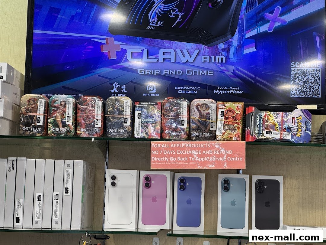 A retail display featuring One Piece and Pokemon card packs, along with various iPhone models.