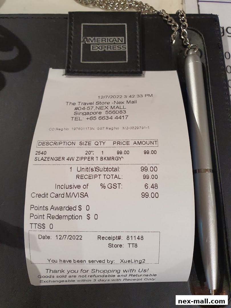 A receipt from The Travel Store showing a purchase of a Slazenger bag.