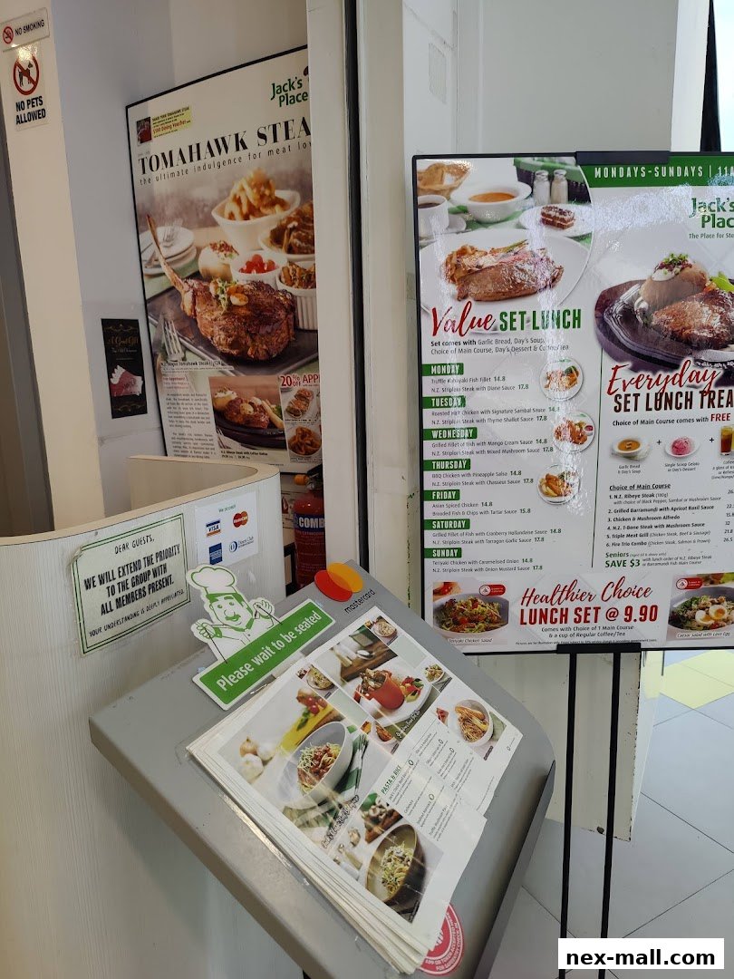 A display of menus and promotional posters for Jack's Place restaurant.