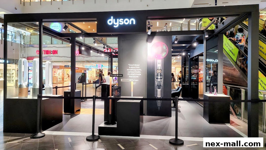 The Dyson store at Nex mall features air purifiers and hair dryers with a prominent brand logo.