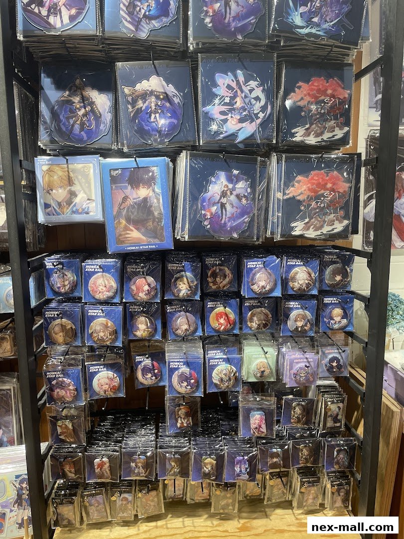 A display shelf filled with anime-themed merchandise, including acrylic stands and buttons.