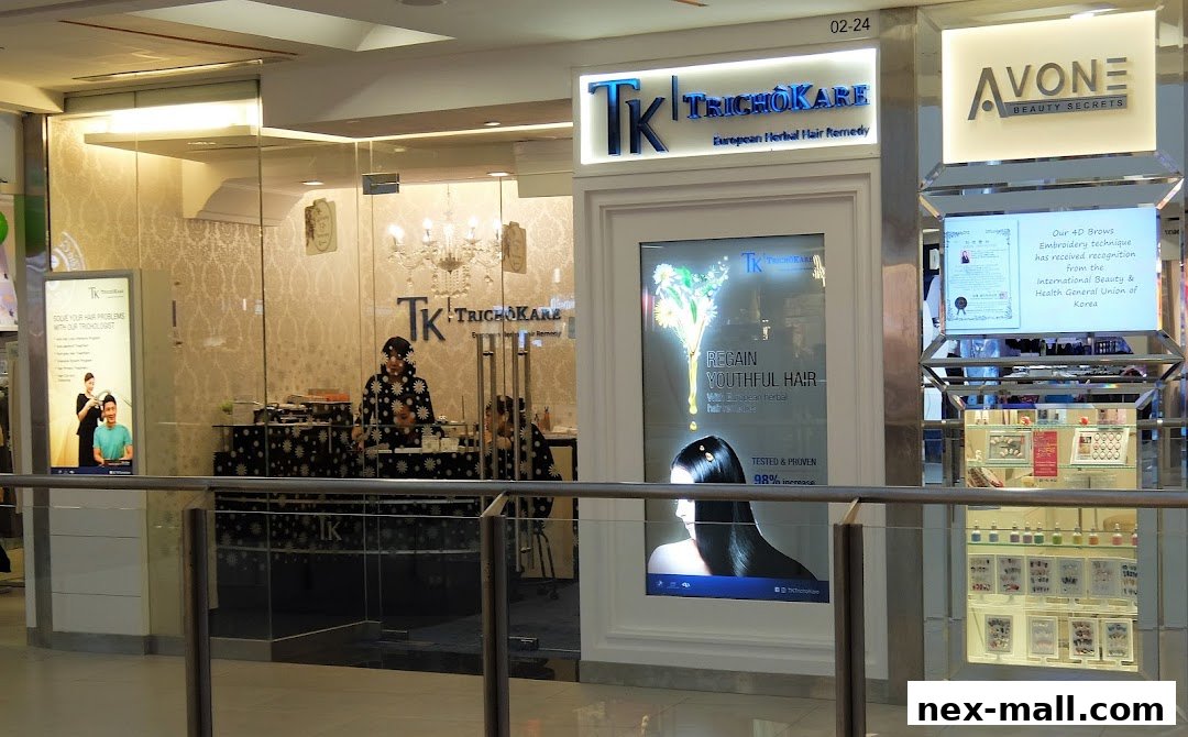 The entrance of TK TrichoKare, a European herbal hair remedy shop, with promotional displays.