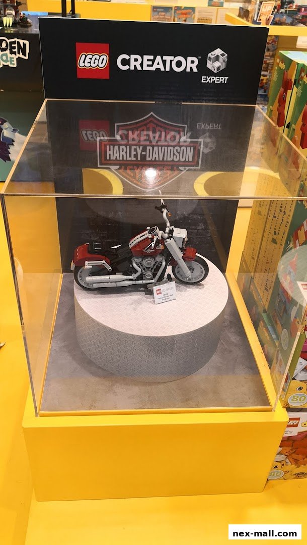 A LEGO Creator Expert Harley-Davidson Fat Boy model displayed in a clear case.
