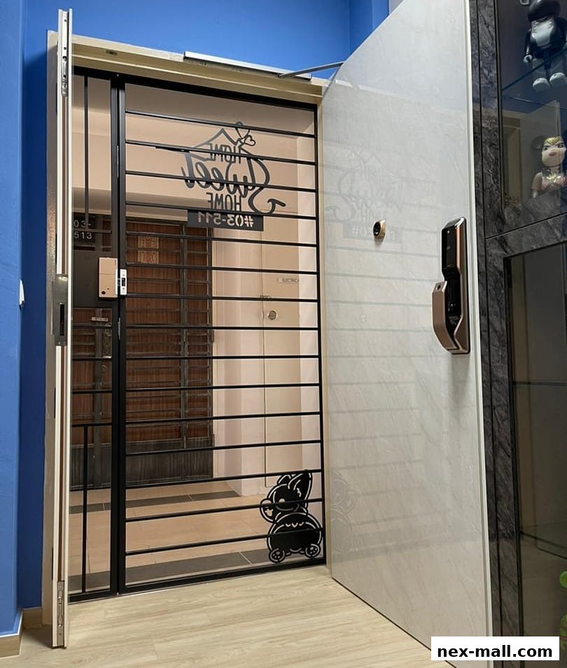 A modern digital lock installed on a white door with a security gate.