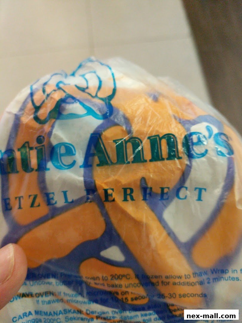 A close-up of a plastic bag containing Auntie Anne's pretzels, showing the brand logo and baking instructions.