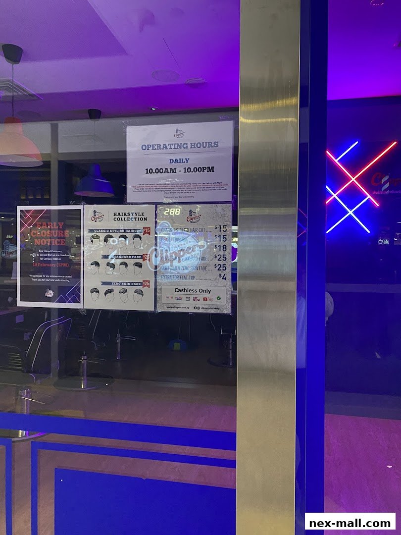 A barber shop window displaying operating hours, hairstyle collection, and prices.