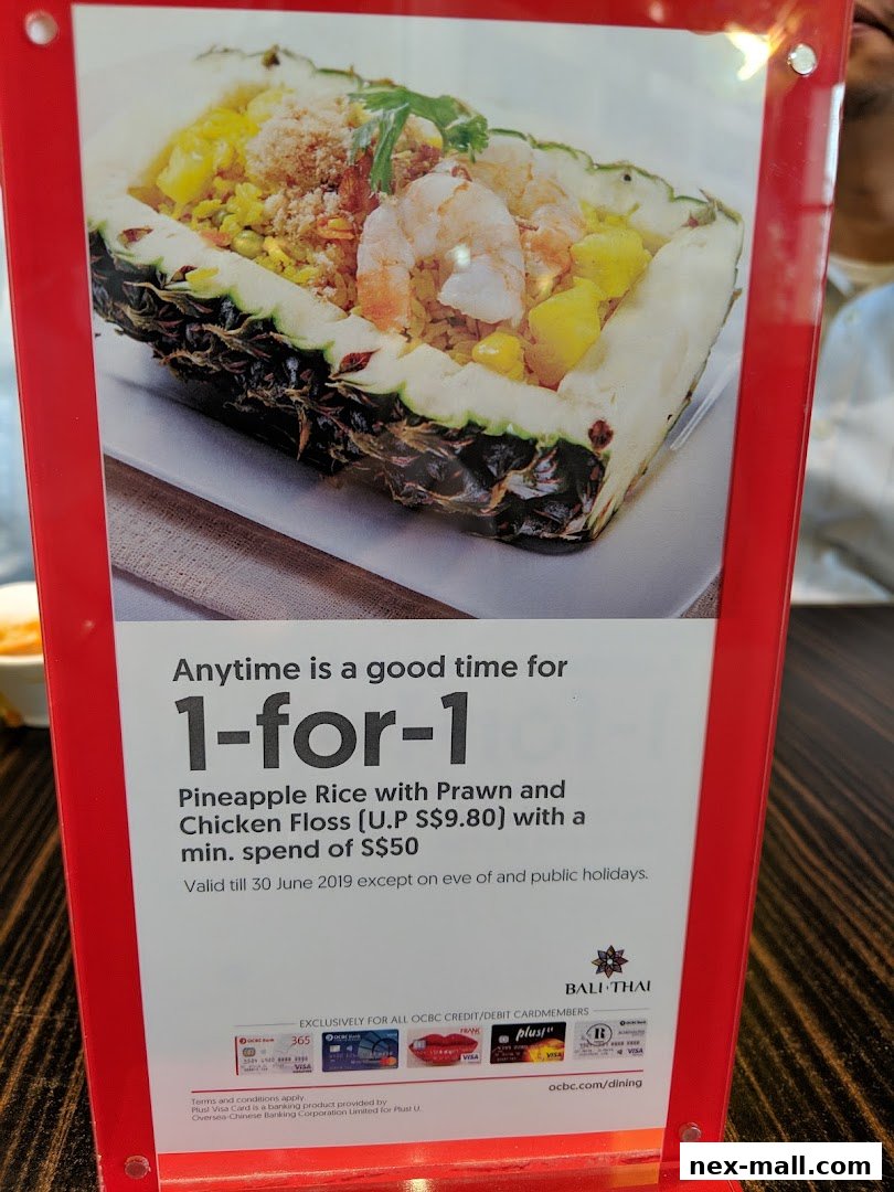 A promotional sign for Bali Thai offering a 1-for-1 deal on Pineapple Rice with Prawn and Chicken Floss.