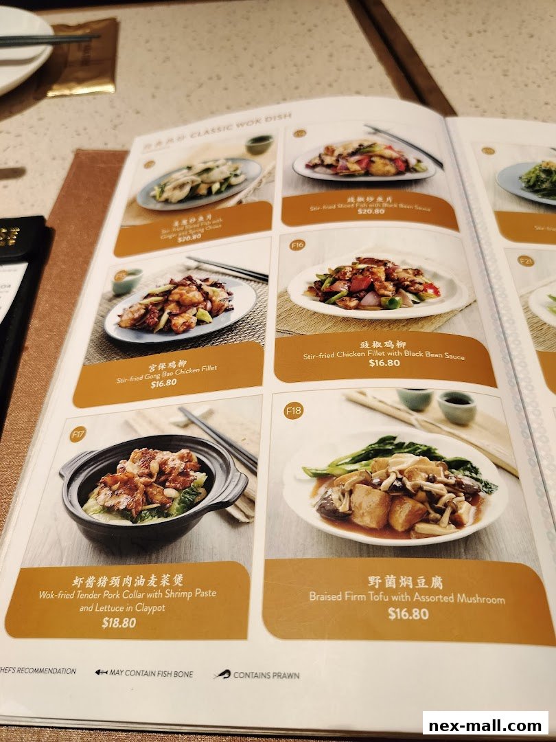 A menu from Canton Paradise showcasing various classic wok dishes with prices.