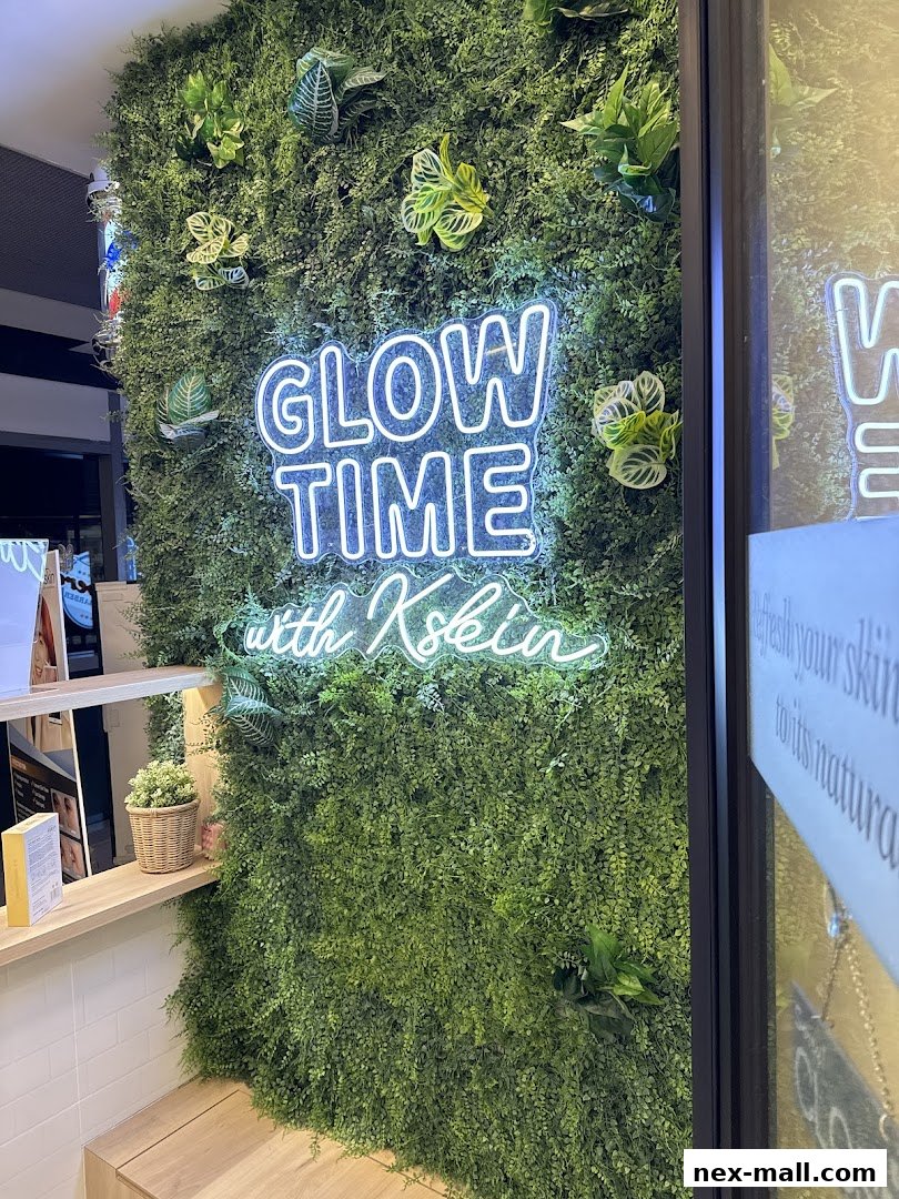 A shop interior with a green wall featuring a neon sign that says 'GLOW TIME with Kskin'.