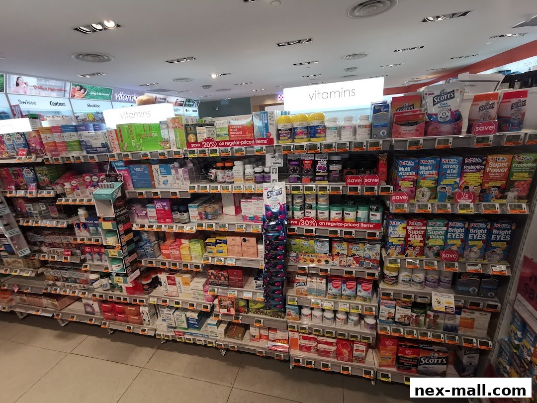 Shelves stocked with vitamins, supplements, and health products in a retail store.