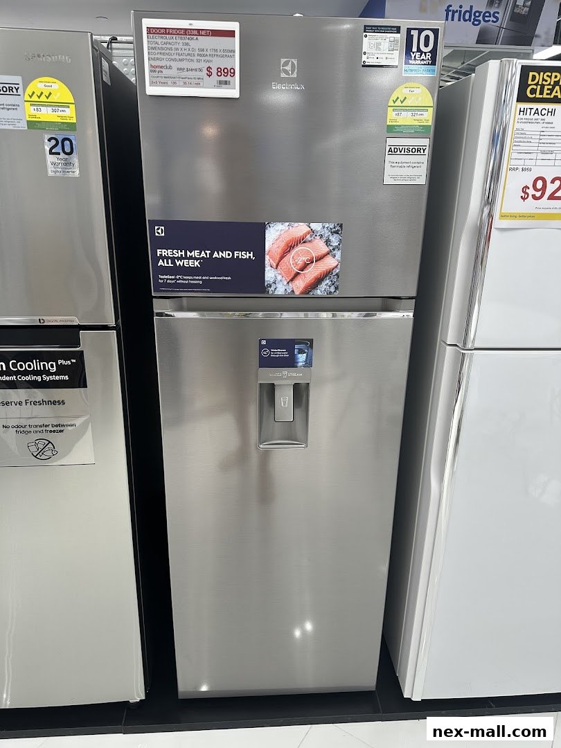 A stainless steel Electrolux refrigerator with a water dispenser and a promotional sticker.
