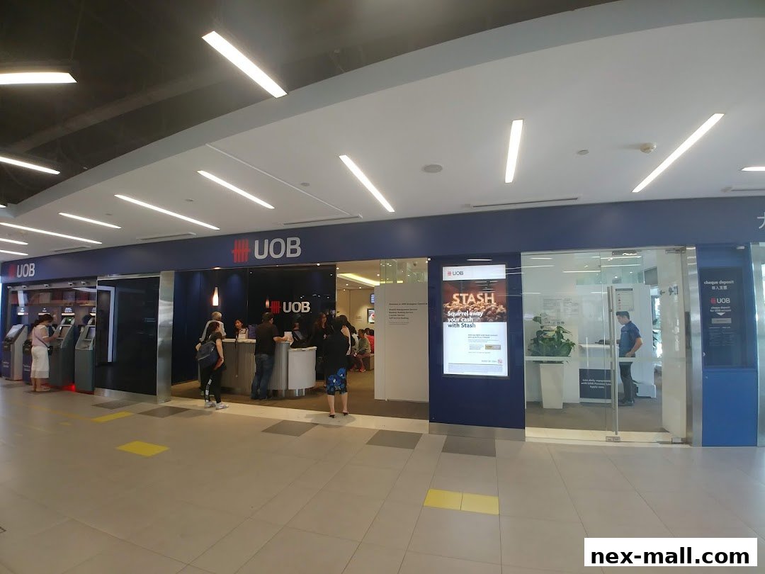 The UOB Serangoon Central Branch features ATMs, a service counter, and a digital display.