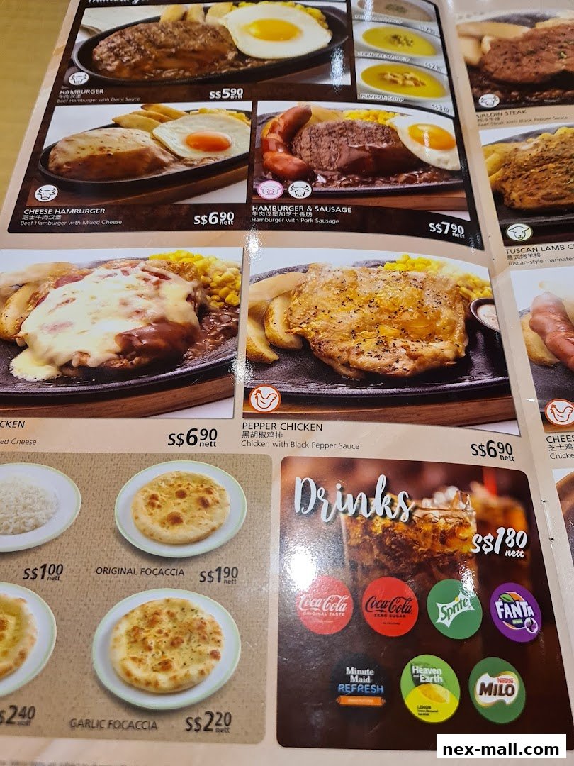 A menu featuring various dishes like hamburgers, chicken, focaccia, and drinks with prices.