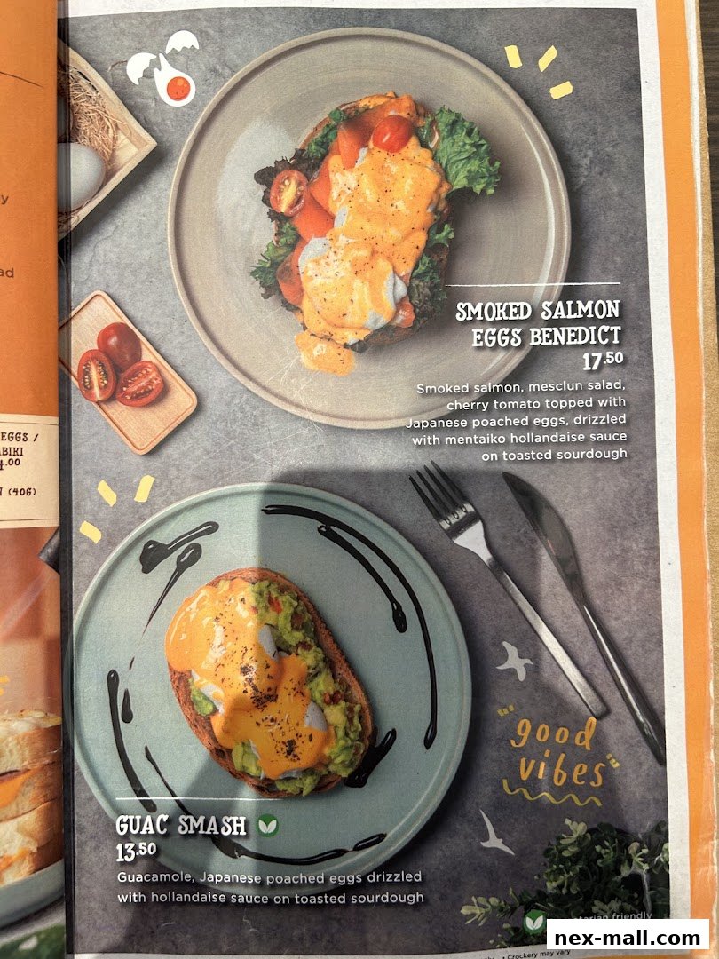 A menu featuring two egg dishes: Smoked Salmon Eggs Benedict and Guac Smash.