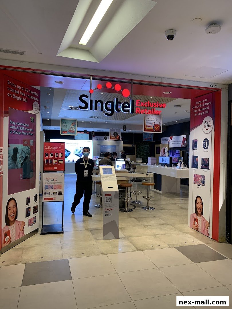 The entrance of a Singtel Exclusive Retailer store with promotional displays and staff inside.