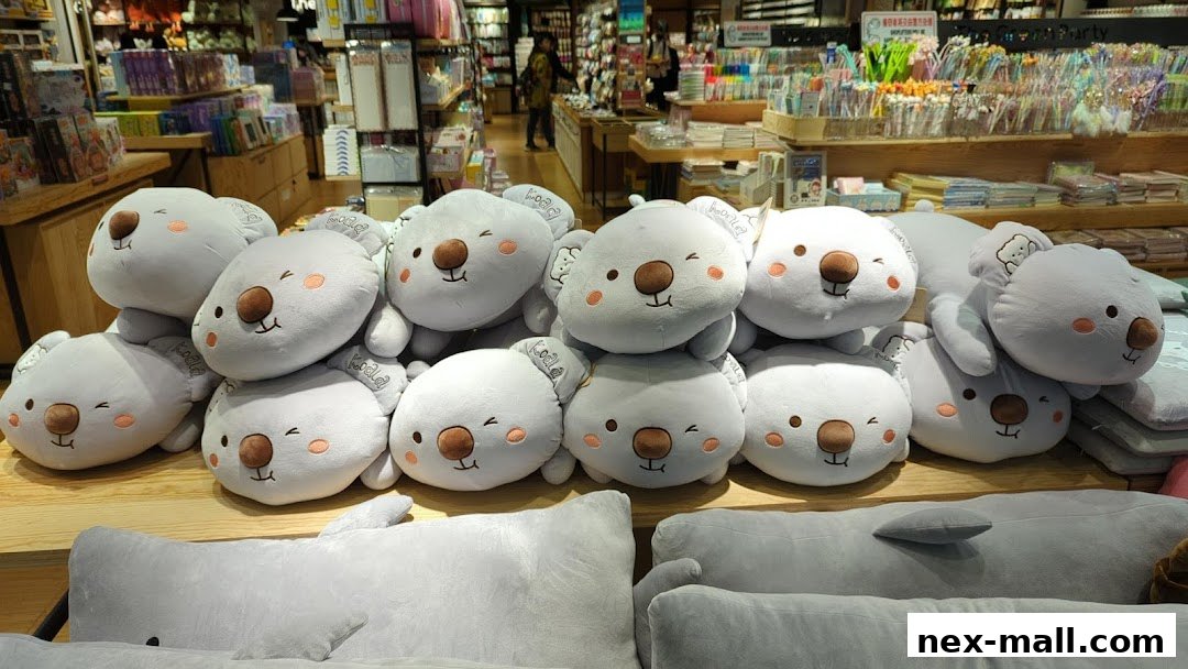 A display of cute, plush koala toys in a retail store.