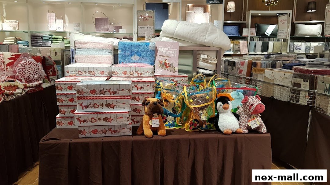 A display of Christmas-themed gift boxes and plush toys at Isetan.