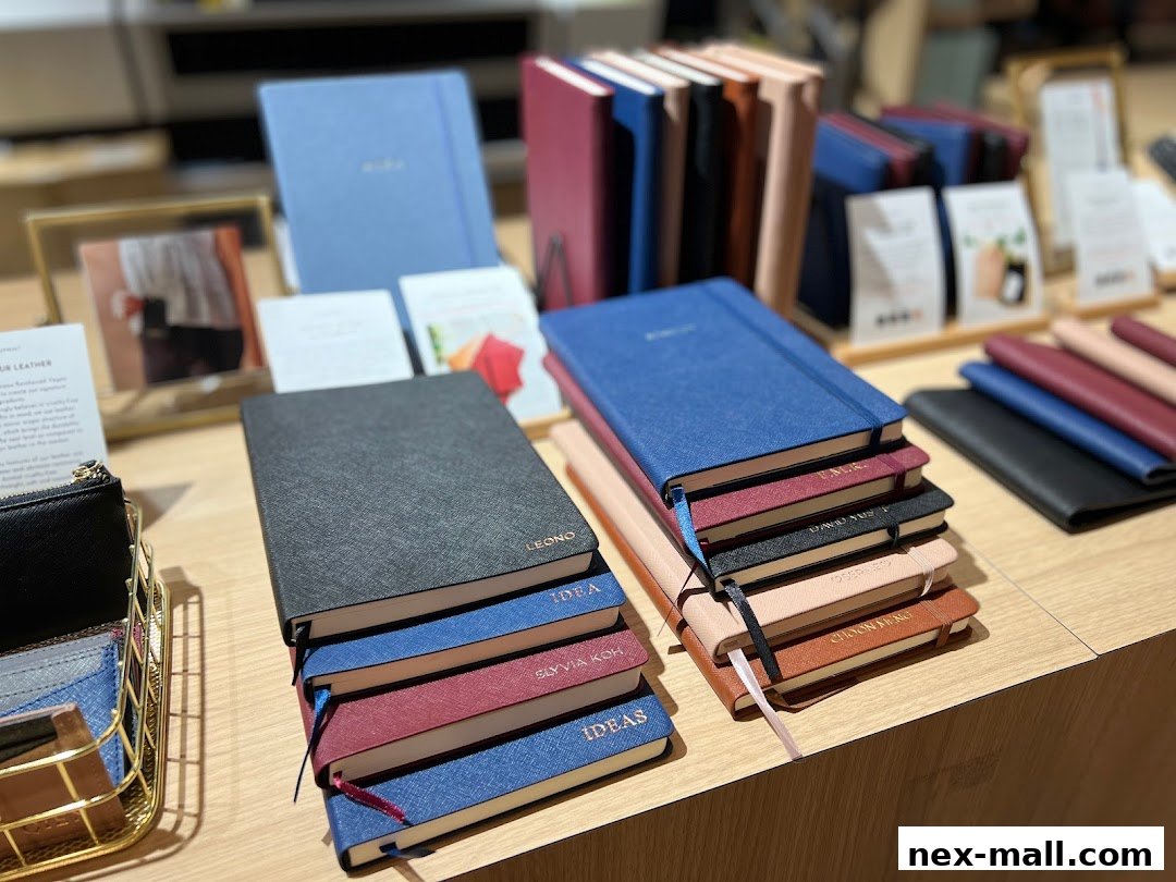A display of personalized notebooks and journals in various colors and sizes.
