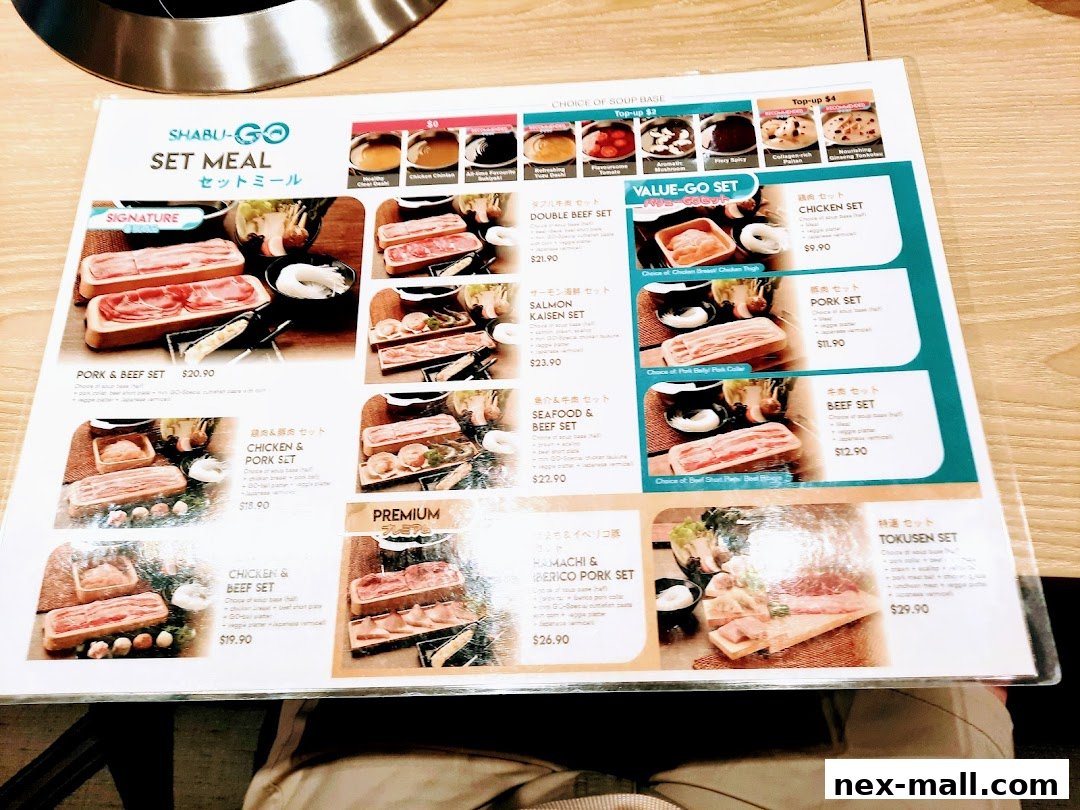 A menu from SHABU-GO featuring various set meals with meat and seafood options.