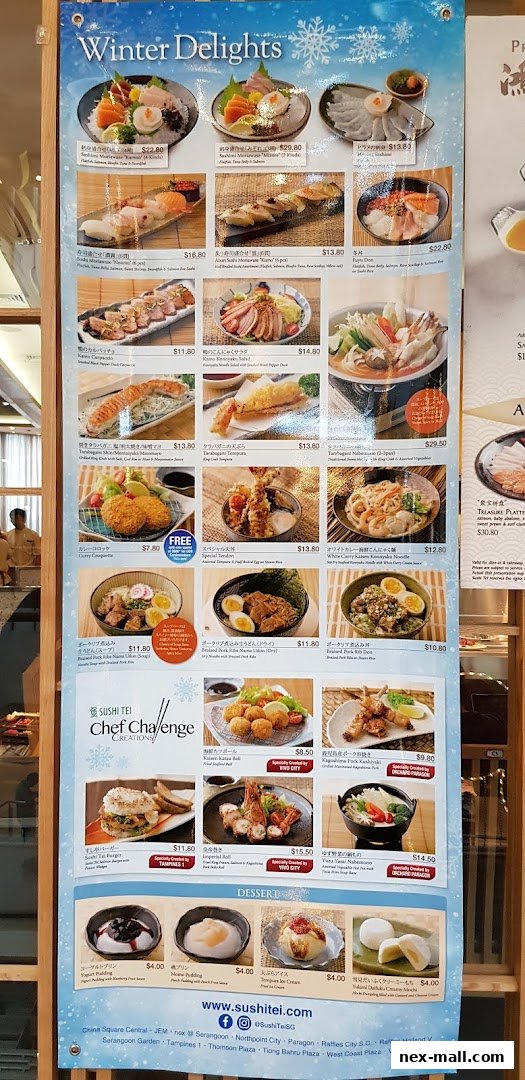A menu from Sushi Tei featuring various Japanese dishes and desserts, with a winter theme.