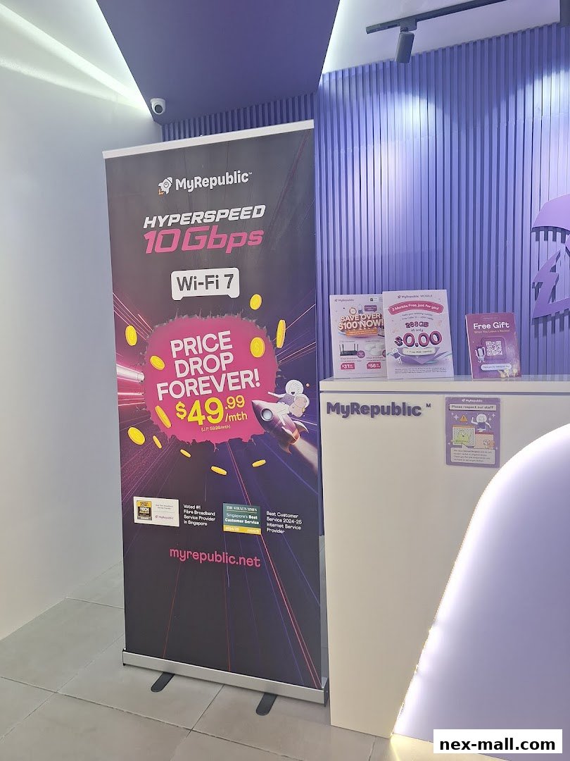 A MyRepublic store display featuring a banner for hyperspeed internet and promotional flyers.