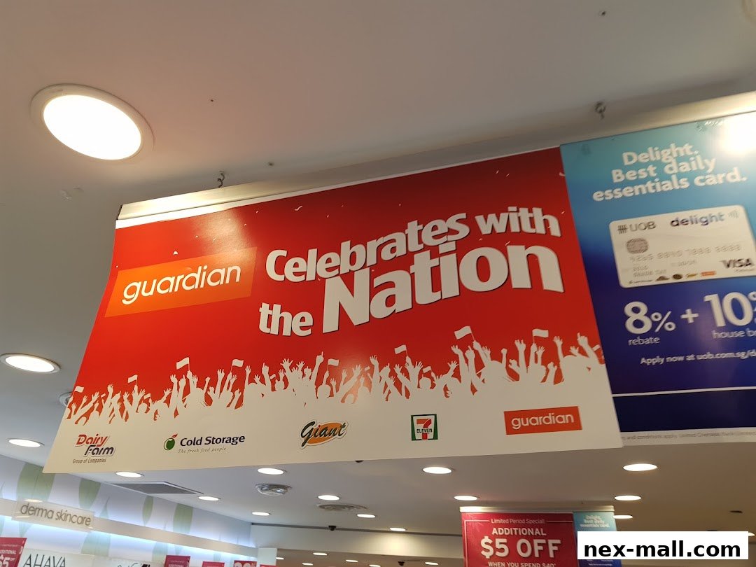 A large banner advertising Guardian's 'Celebrates with the Nation' campaign, featuring other brands.