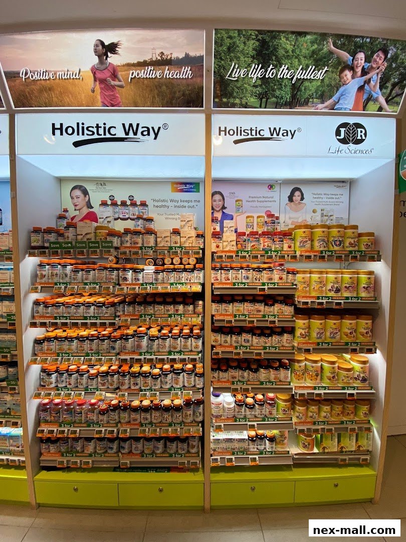 Shelves stocked with various health supplements and vitamins from the brand Holistic Way.