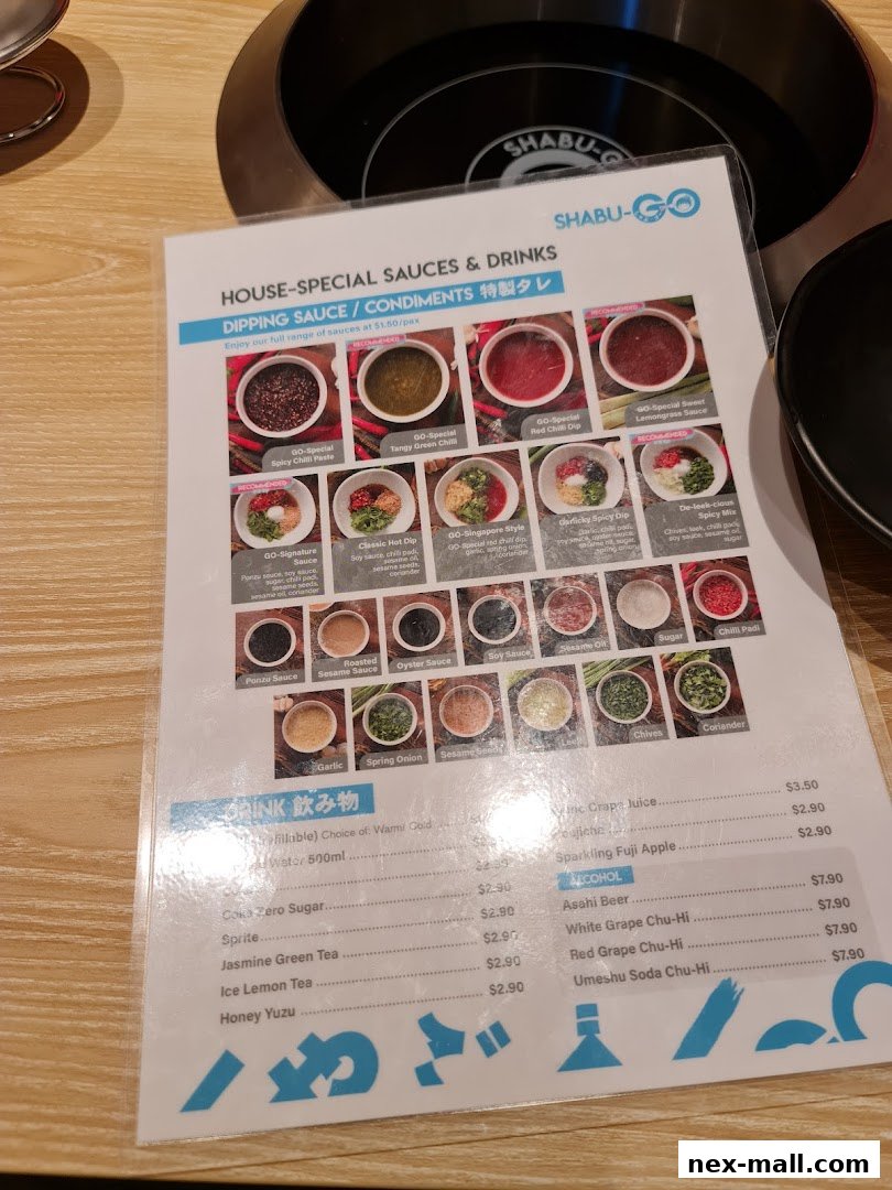 A menu for SHABU-GO featuring dipping sauces, condiments, and drinks.