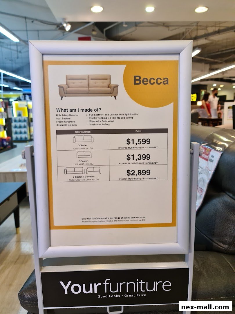 A display board showcasing the 'Becca' sofa with its specifications and prices.
