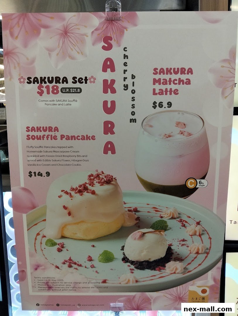 A menu board featuring Sakura-themed desserts and drinks with beautiful food photography.