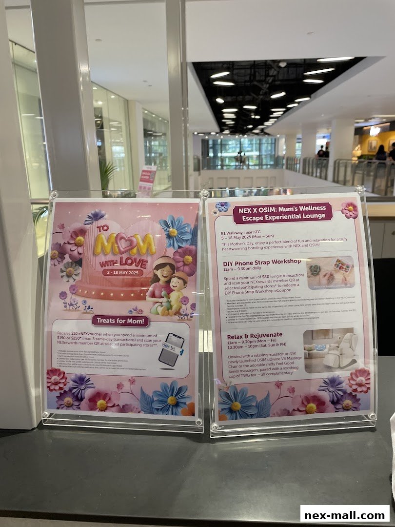 Two promotional posters displayed on a counter, advertising Mother's Day events and offers.