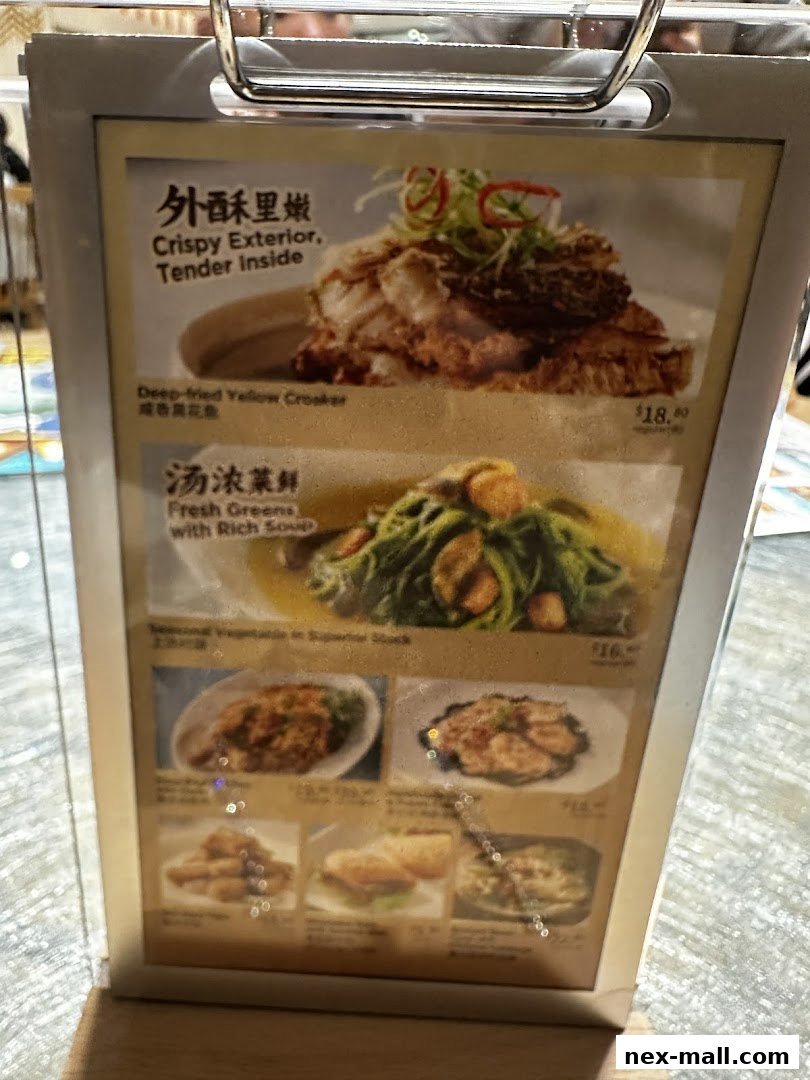 A menu display featuring delicious Chinese dishes with enticing descriptions and prices.